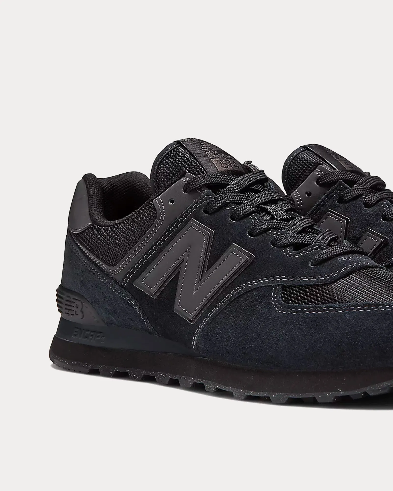 574 Black Low Top Sneakers