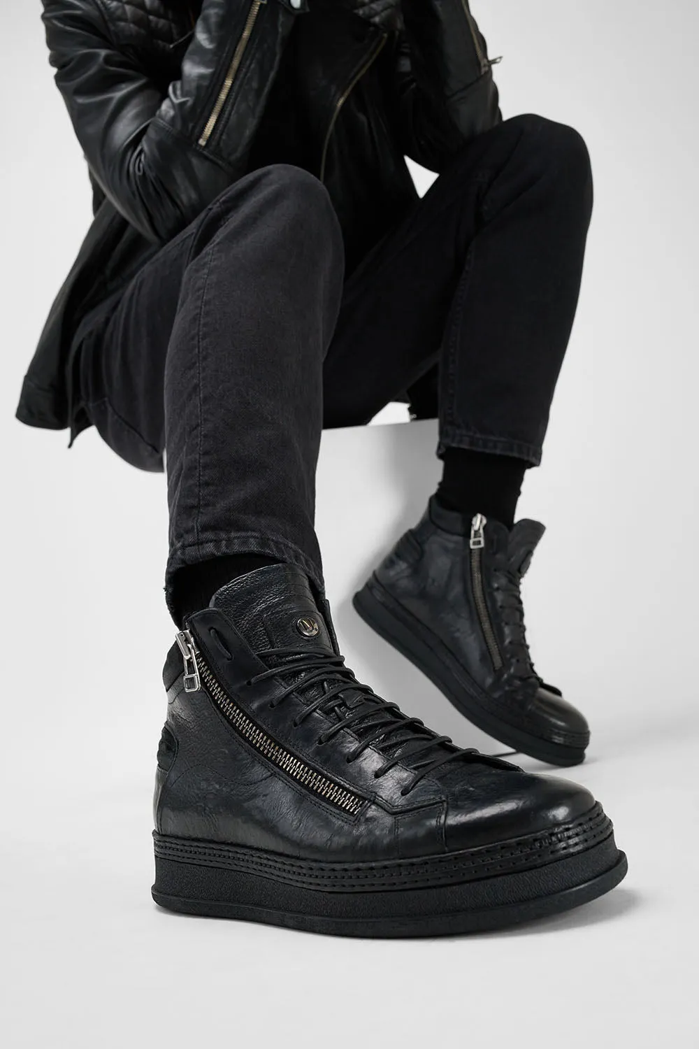 COLE rugged-black double-zip welted high sneakers.